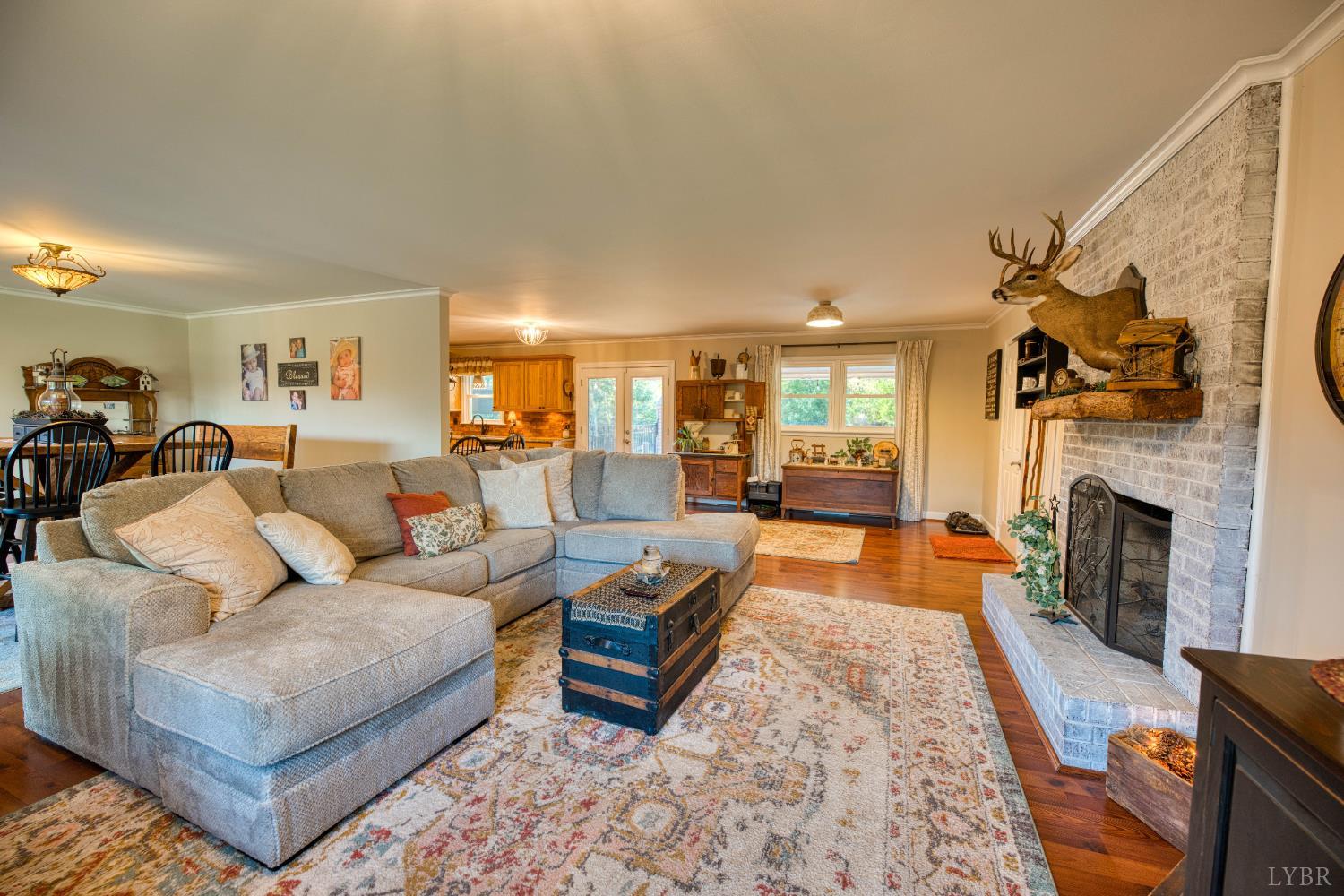 2287 Johnson Creek Road Evington, VA 24550 - Photo 14 of 70 a living room with furniture and a fireplace