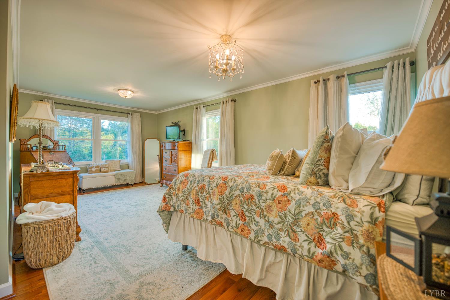 2287 Johnson Creek Road Evington, VA 24550 - Photo 24 of 70 a bedroom with a bed and a couch