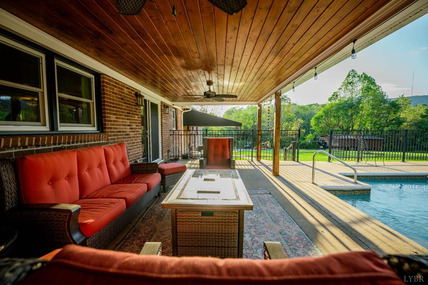 2287 Johnson Creek Road Evington, VA 24550 - Photo 44 of 70 a view of swimming pool with seating area