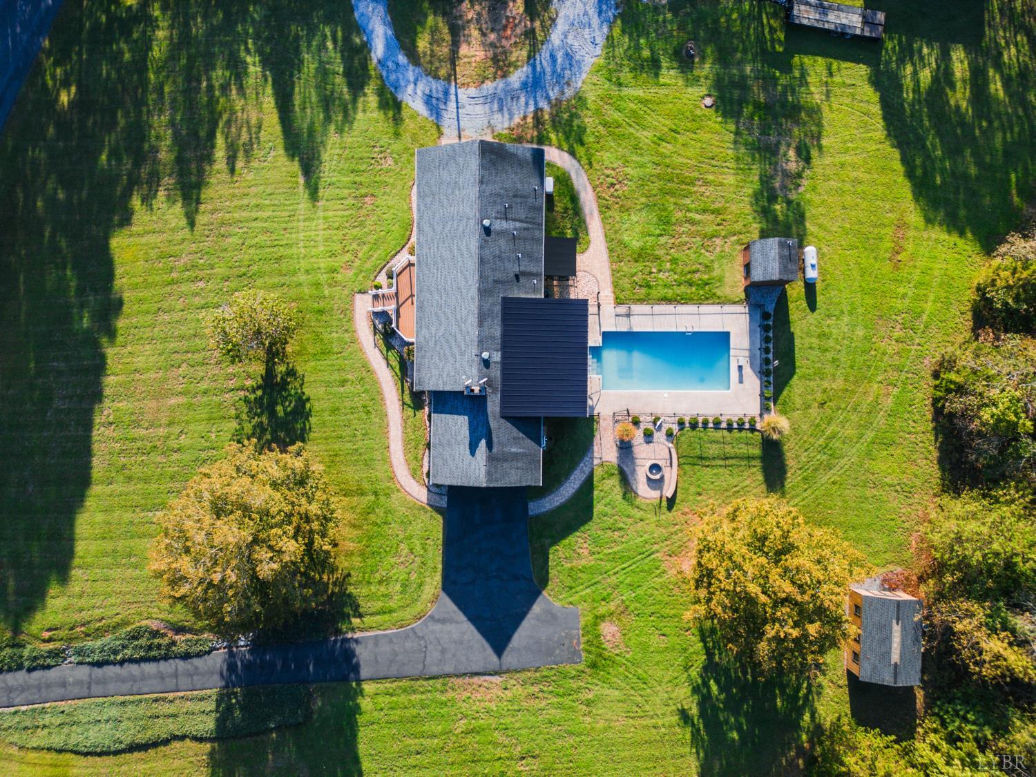 2287 Johnson Creek Road Evington, VA 24550 - Photo 65 of 70 a aerial view of a house with a garden