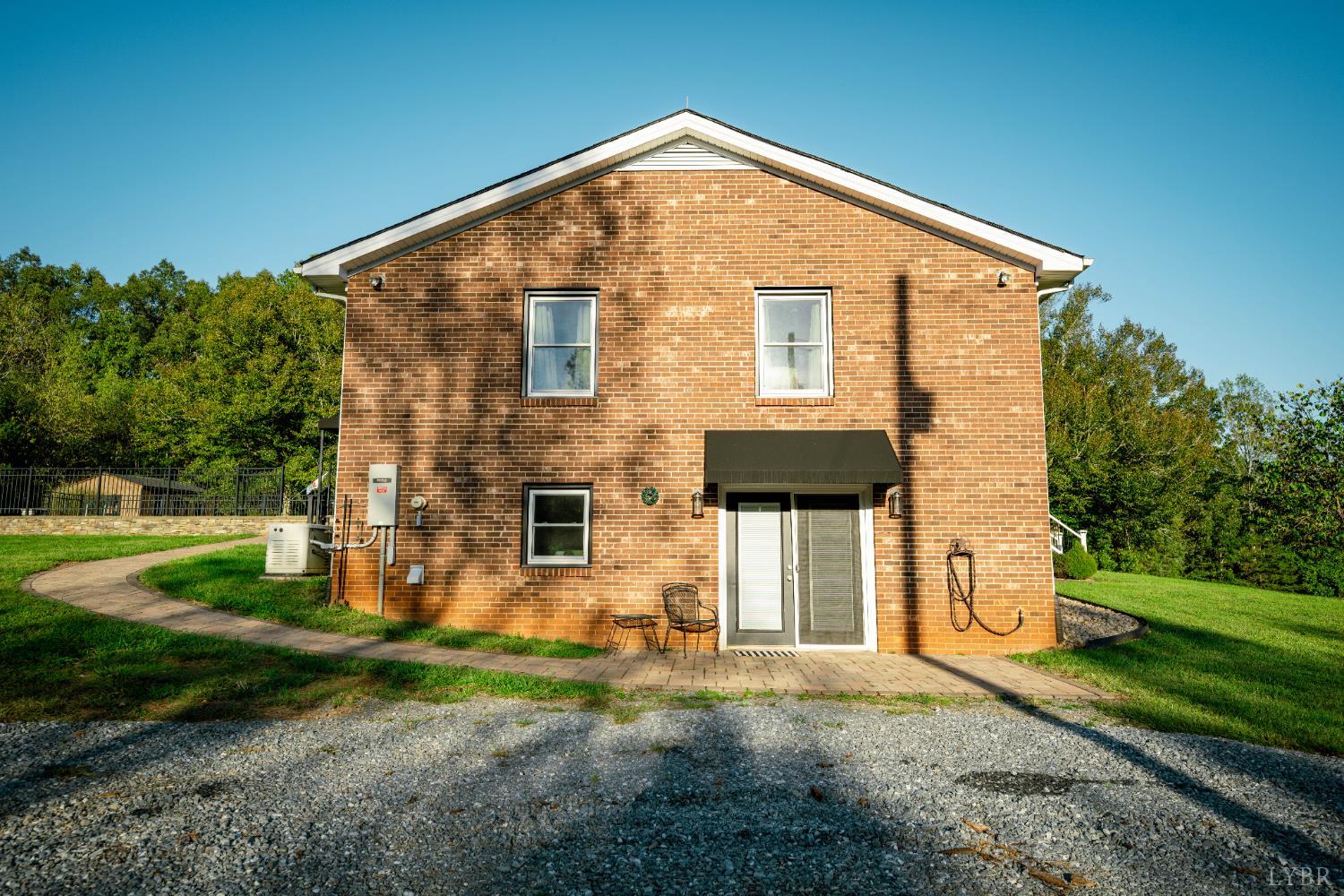 2287 Johnson Creek Road Evington, VA 24550 - Photo 69 of 70 a front view of a house with a yard
