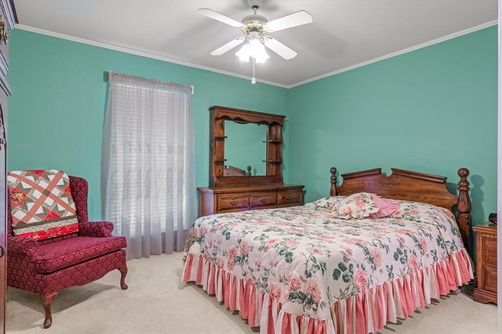 114 Granada Square Canton, TX 75103 - Photo 13 of 23 a bedroom with a bed and window
