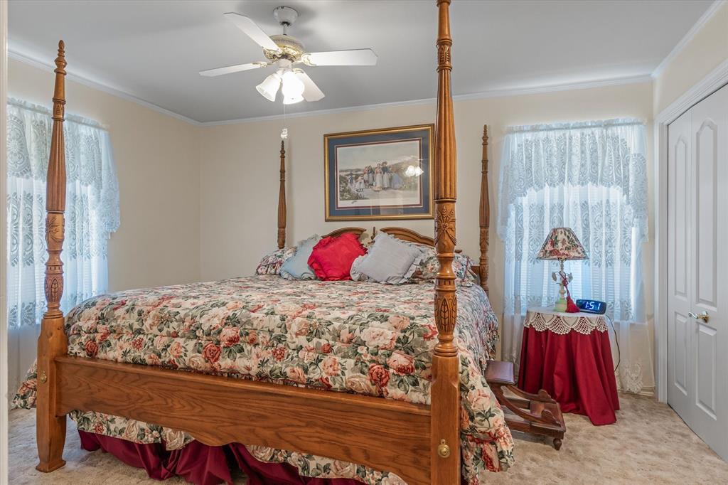 114 Granada Square Canton, TX 75103 - Photo 15 of 23 a bedroom with a bed and a window