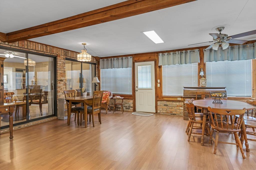 114 Granada Square Canton, TX 75103 - Photo 16 of 23 a dining room with furniture window and wooden floor