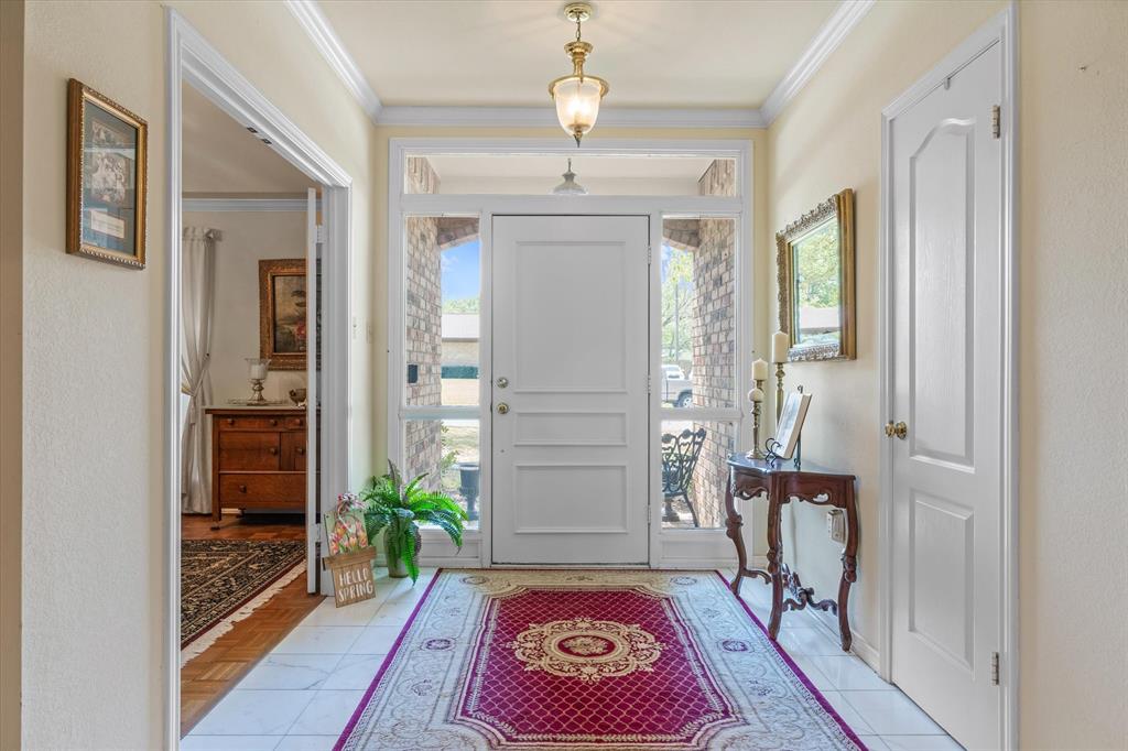 114 Granada Square Canton, TX 75103 - Photo 5 of 23 a view of an entryway with a rug
