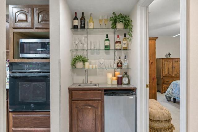 114 Granada Square Canton, TX 75103 - Photo 6 of 23 a bedroom with a bed and a potted plant