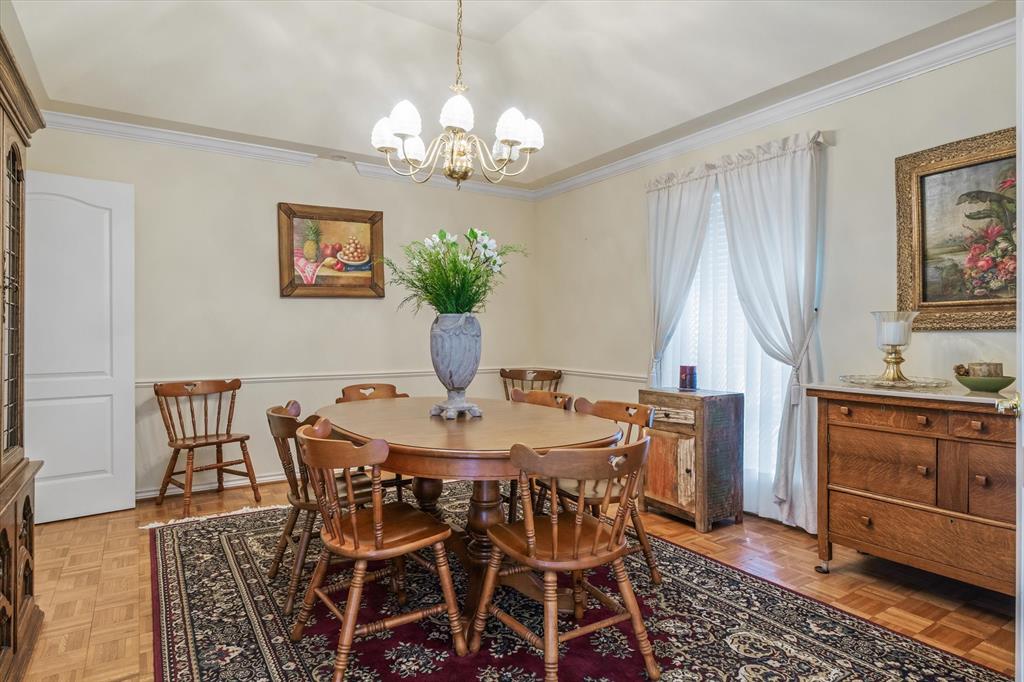 114 Granada Square Canton, TX 75103 - Photo 8 of 23 a view of a dining room with furniture and chandelier