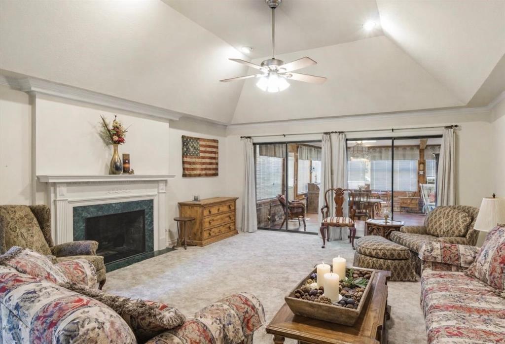 114 Granada Square Canton, TX 75103 - Photo 9 of 23 a living room with furniture and a fireplace