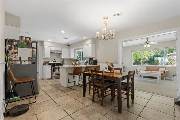 a view of a dining room with furniture