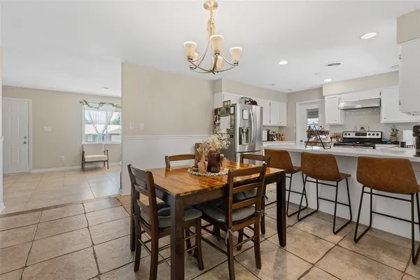 a view of a dining room and livingroom