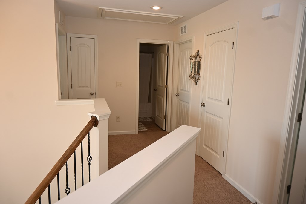 7279 Double Pine Drive Midland, GA 31820 - Photo 18 of 26 a view of a hallway with closet and front door
