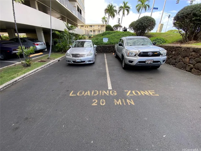 a cars parked in front of a building