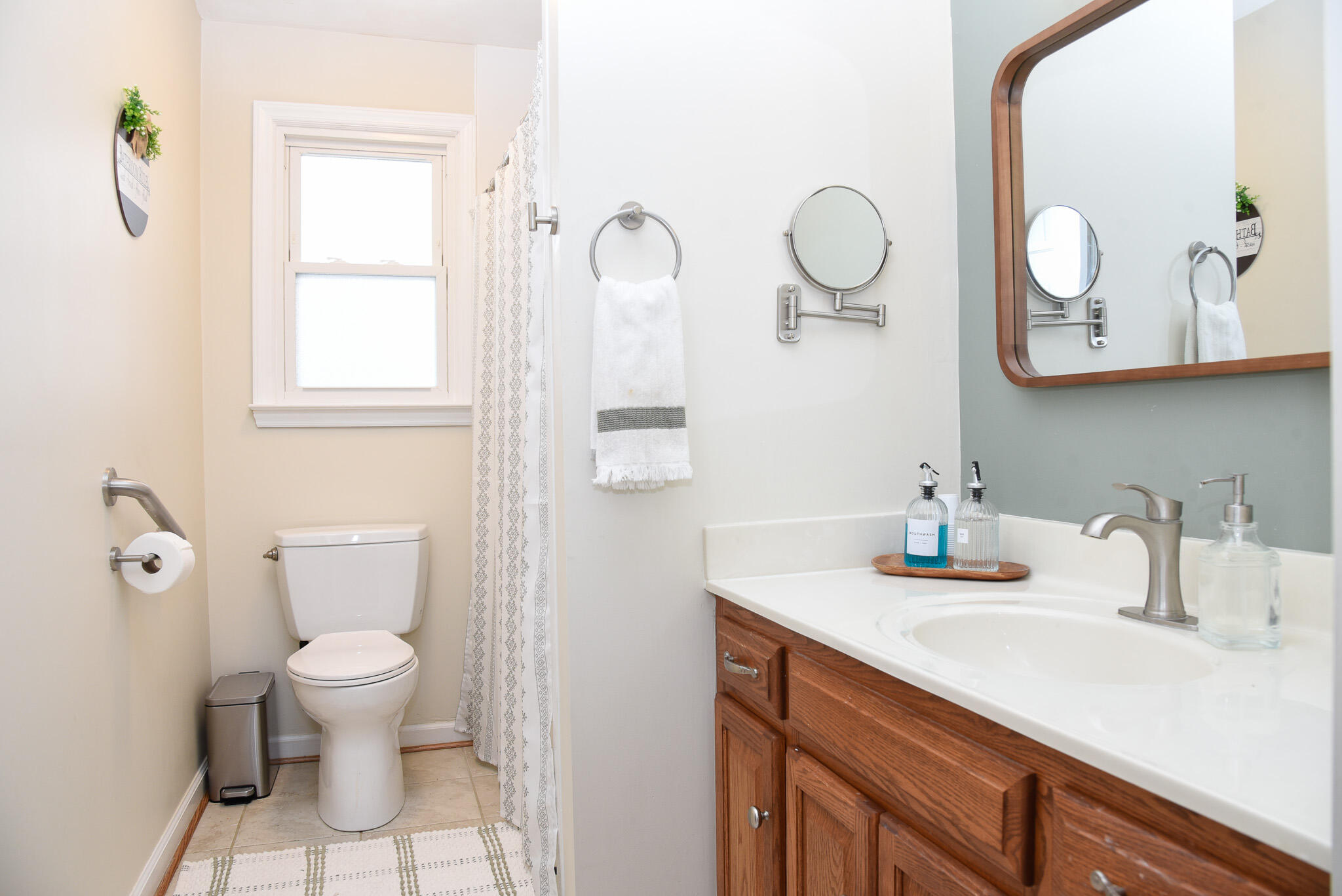 28 Spruce Circle Blue Ridge, VA 24064 - Photo 11 of 36 a bathroom with a granite countertop sink a toilet and a mirror
