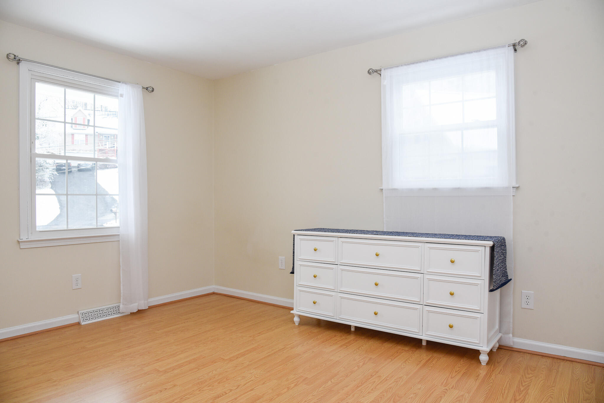 28 Spruce Circle Blue Ridge, VA 24064 - Photo 13 of 36 a view of an empty room with a window and dresser