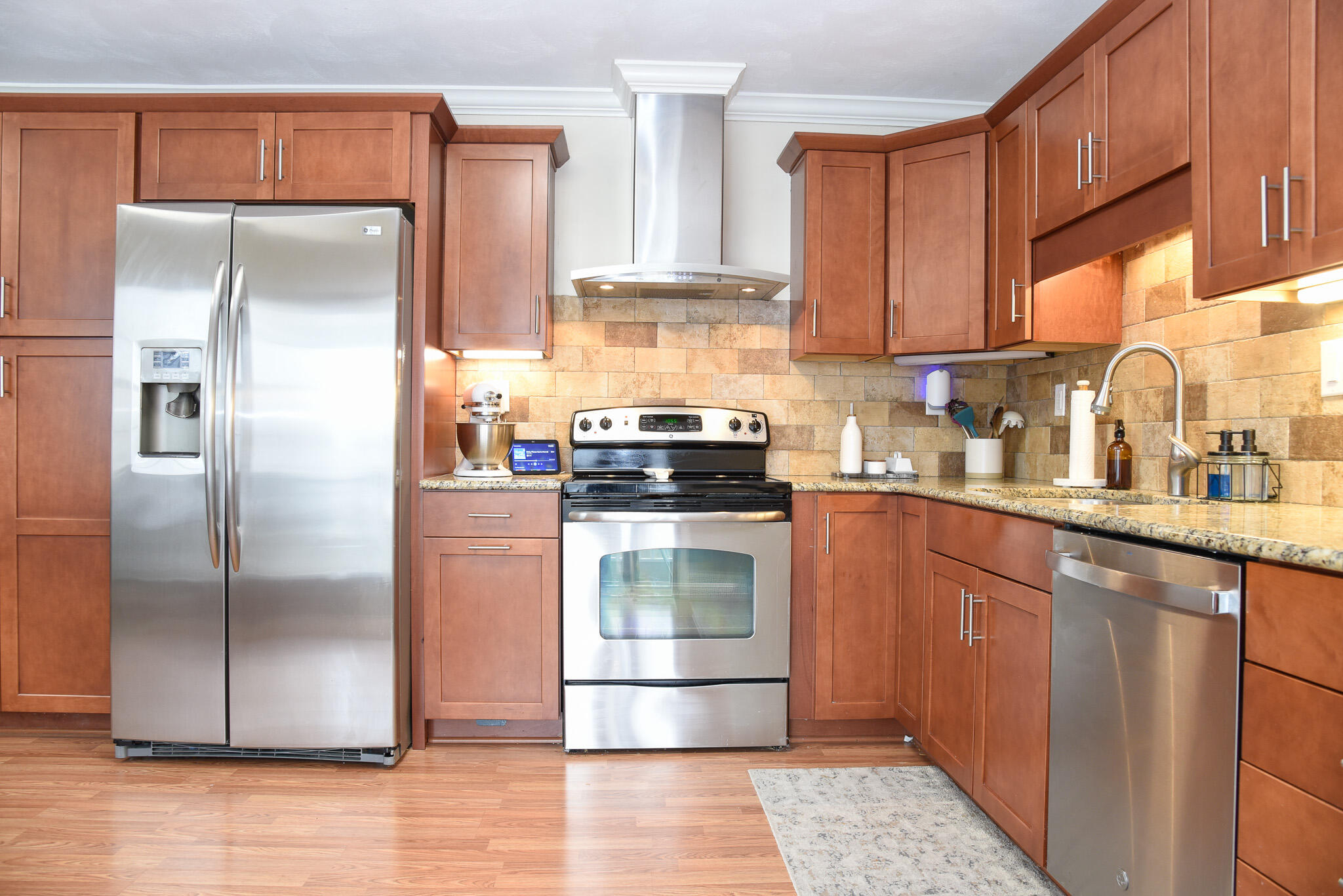 28 Spruce Circle Blue Ridge, VA 24064 - Photo 8 of 36 a kitchen with granite countertop a refrigerator and a sink