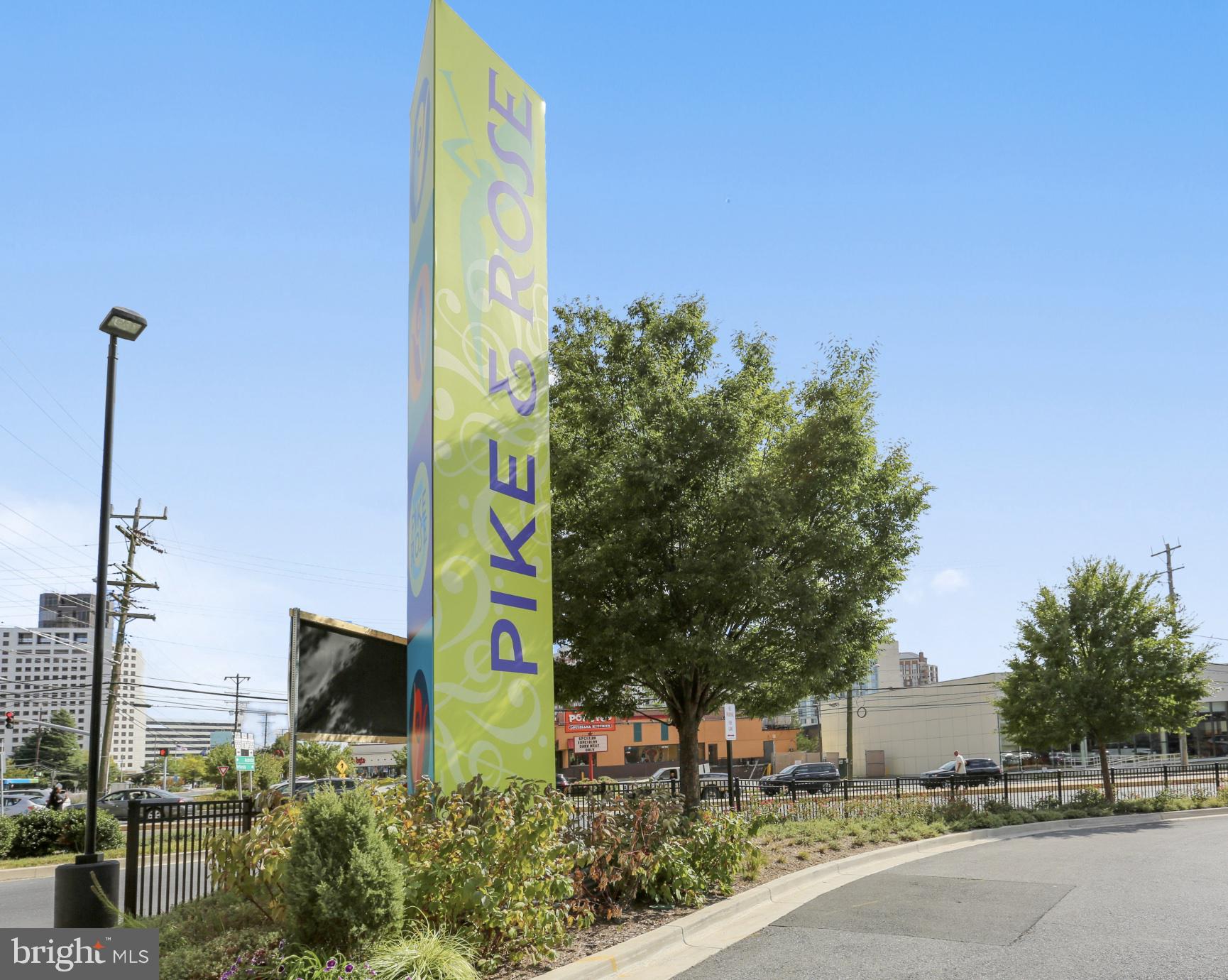 11710 Old Georgetown Road, Unit 1012 North Bethesda, MD 20852 - Photo 6 of 6 a street sign on a wall next to a road