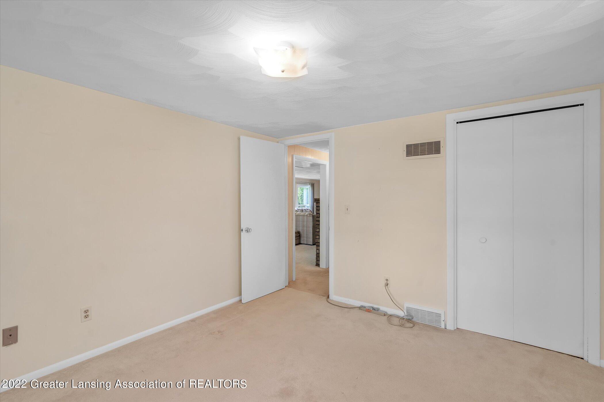 12854 Rambler Road Dewitt, MI 48820 - Photo 24 of 48 Lower Lev 3rd Bedroom