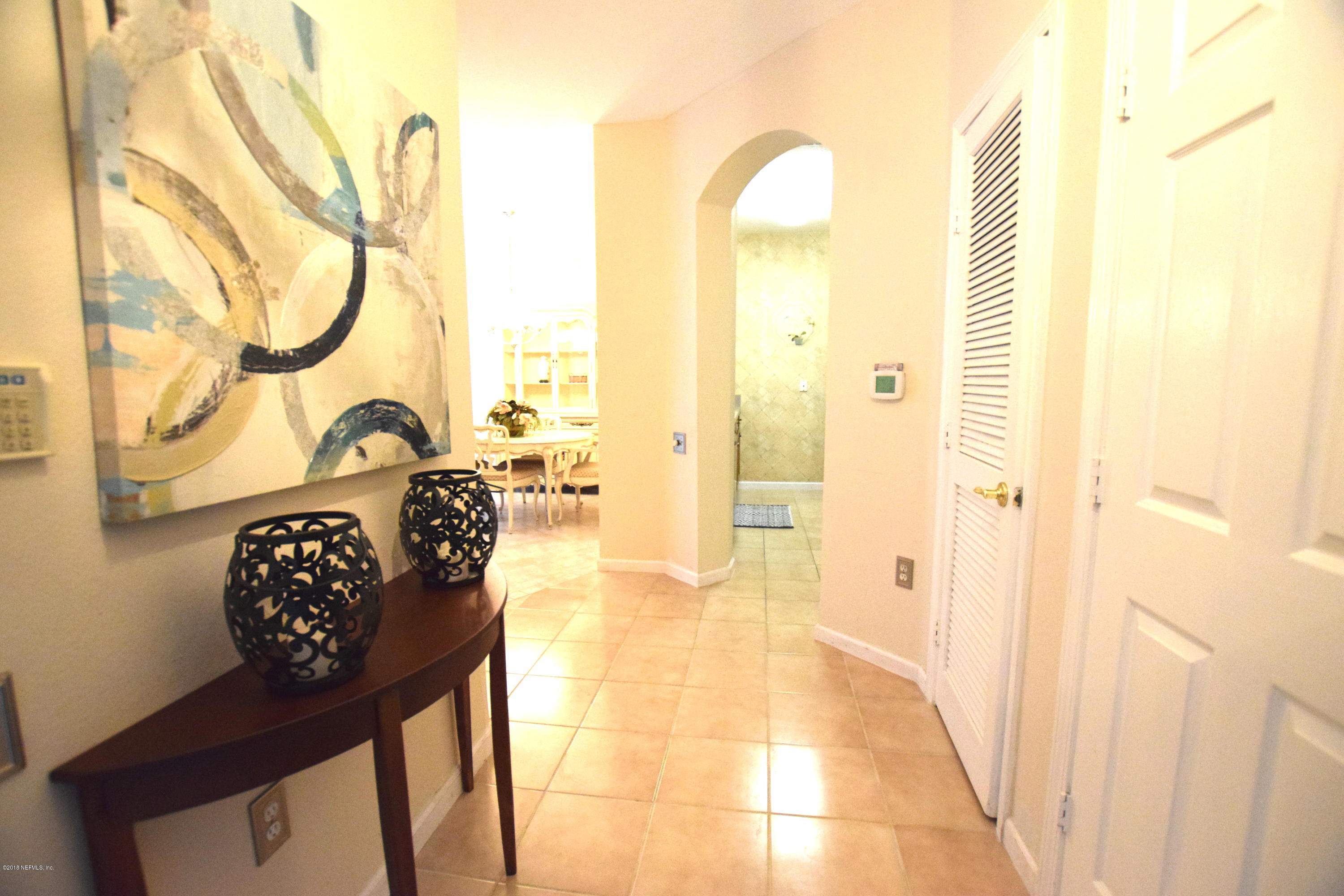 10550 Baymeadows Road, Unit 1016 Jacksonville, FL 32256 - Photo 1 of 17 a view of a bathroom with a tub and shower