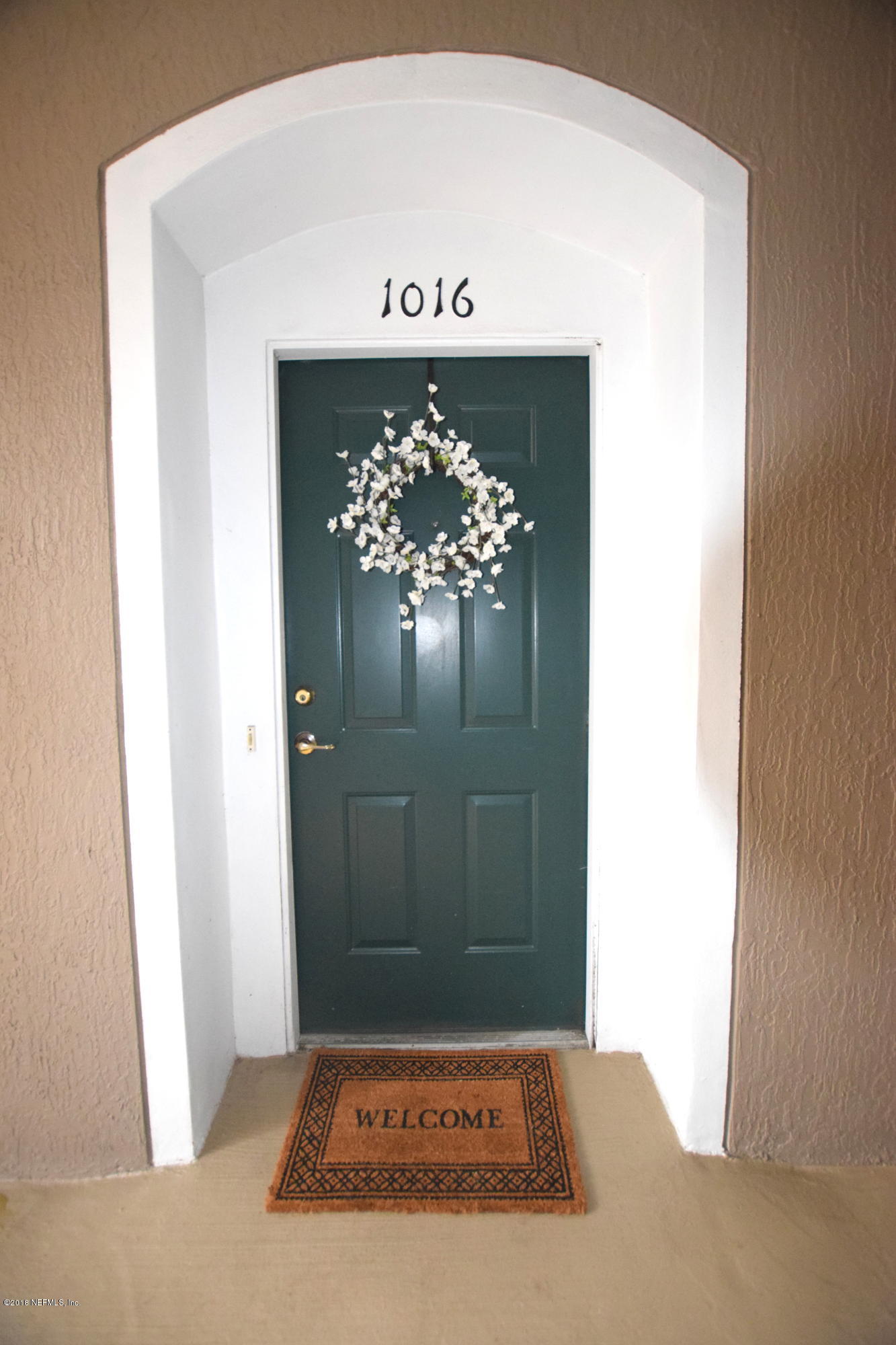 10550 Baymeadows Road, Unit 1016 Jacksonville, FL 32256 - Photo 16 of 17 a view of a door in the hallway