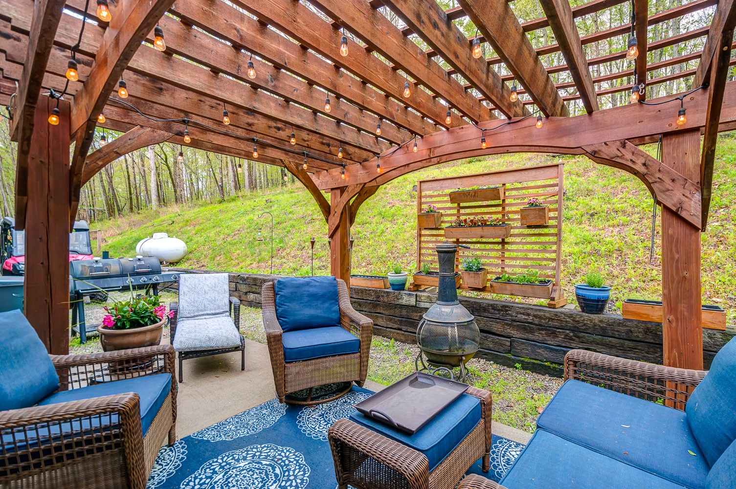 5934 Garrison Road Franklin, TN 37064 - Photo 11 of 39 a outdoor living space with furniture and garden view
