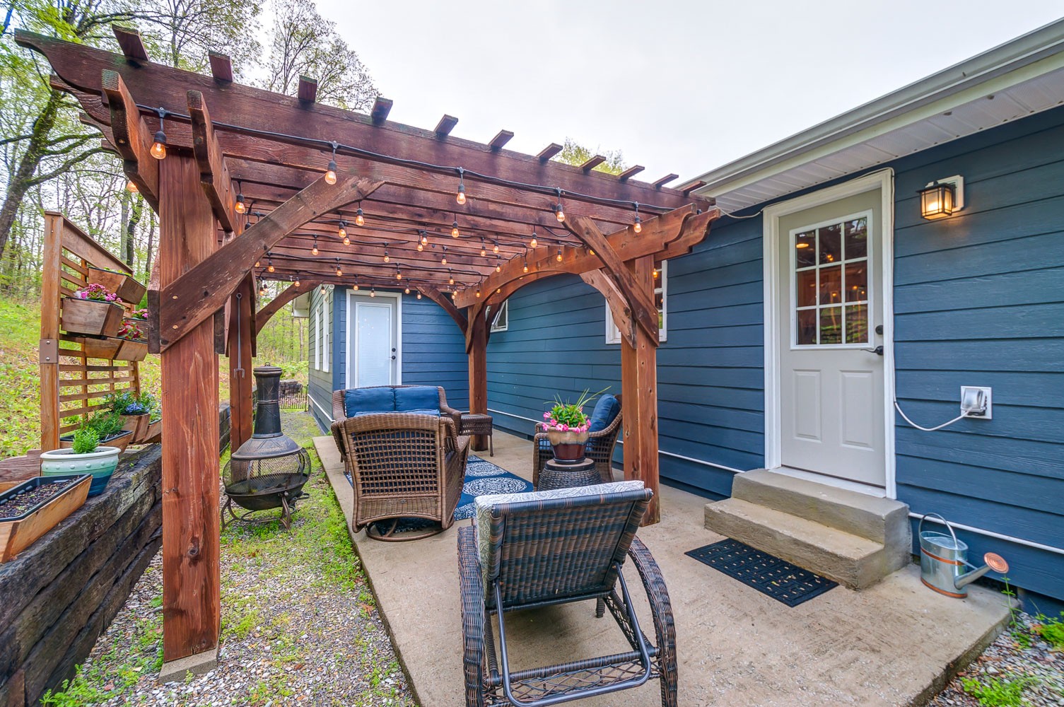 5934 Garrison Road Franklin, TN 37064 - Photo 13 of 39 a view of a patio with a table and chairs