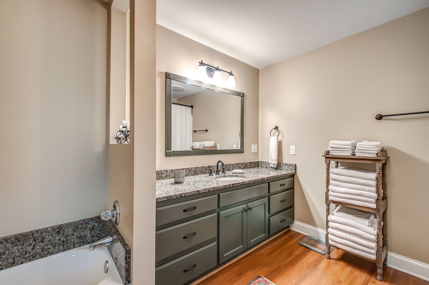 5934 Garrison Road Franklin, TN 37064 - Photo 29 of 39 a bathroom with a sink and a mirror