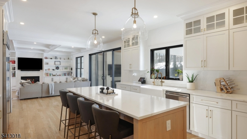 1613 Rising Way Westfield, NJ 07090 - Photo 18 of 50 a kitchen with stainless steel appliances a sink a counter top space and a window