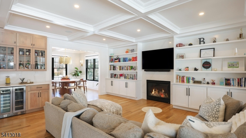 1613 Rising Way Westfield, NJ 07090 - Photo 24 of 50 a living room with furniture fireplace and flat screen tv