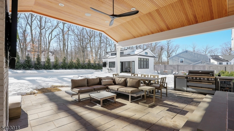 1613 Rising Way Westfield, NJ 07090 - Photo 27 of 50 a living room with furniture and a fireplace