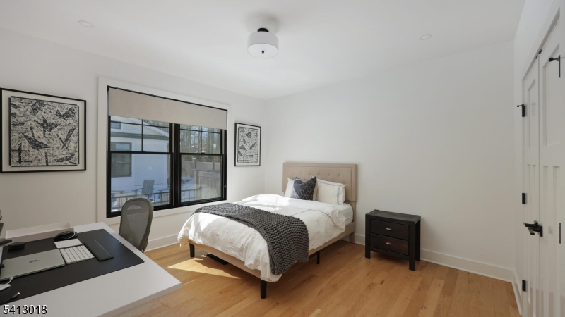 1613 Rising Way Westfield, NJ 07090 - Photo 30 of 50 a bedroom with a bed and a desk