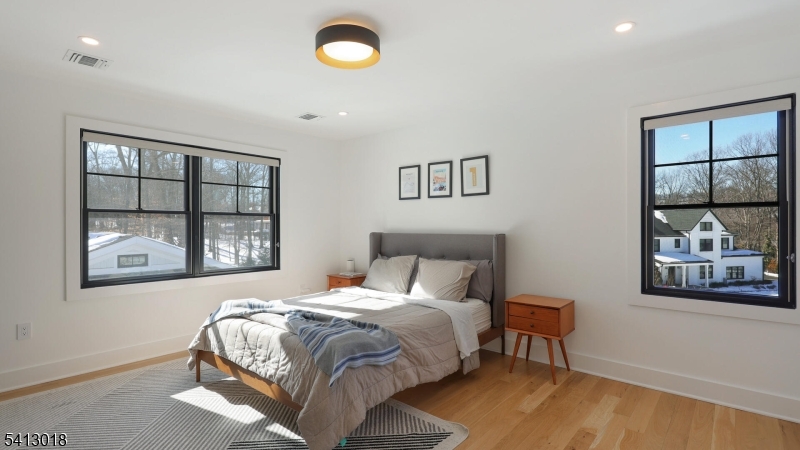 1613 Rising Way Westfield, NJ 07090 - Photo 42 of 50 a bedroom with a bed and a window