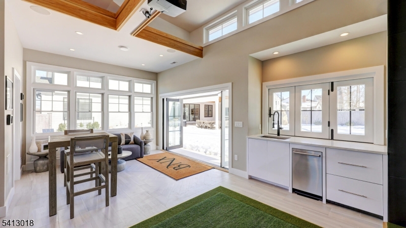 1613 Rising Way Westfield, NJ 07090 - Photo 50 of 50 a living room with furniture and large windows