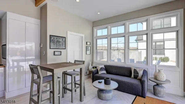 a view of swimming pool with chairs