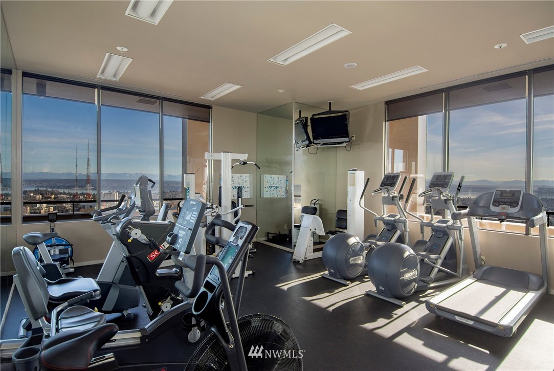 1301 Spring Street, Unit 20G Seattle, WA 98104 - Photo 14 of 24 a view of a room with gym equipment