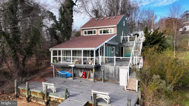 a view of house with outdoor seating