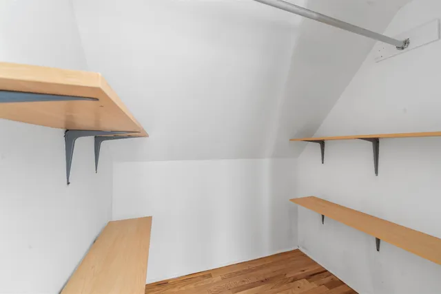 a view of small space with racks on the wall