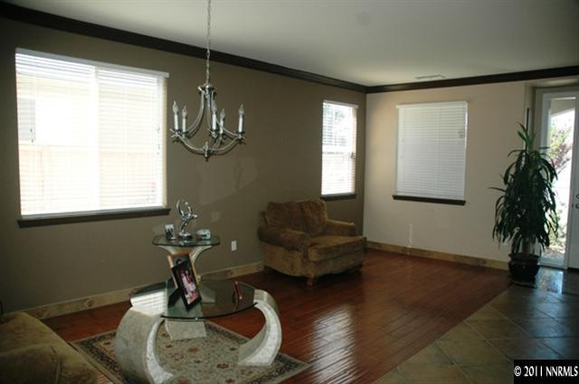 10760 Copper Lake Drive Reno, NV 89521 - Photo 4 of 8 a living room with furniture and a window