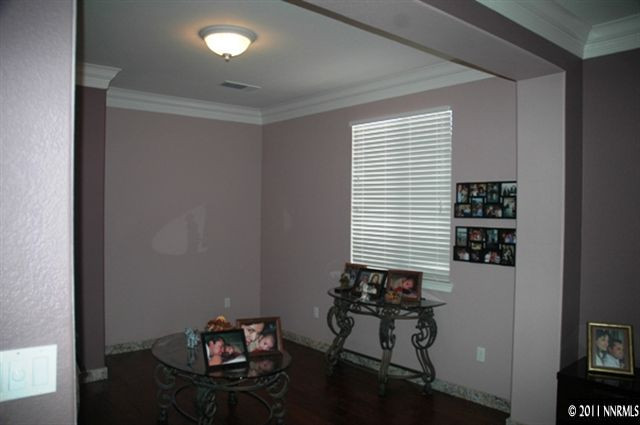 10760 Copper Lake Drive Reno, NV 89521 - Photo 5 of 8 a room with furniture and window