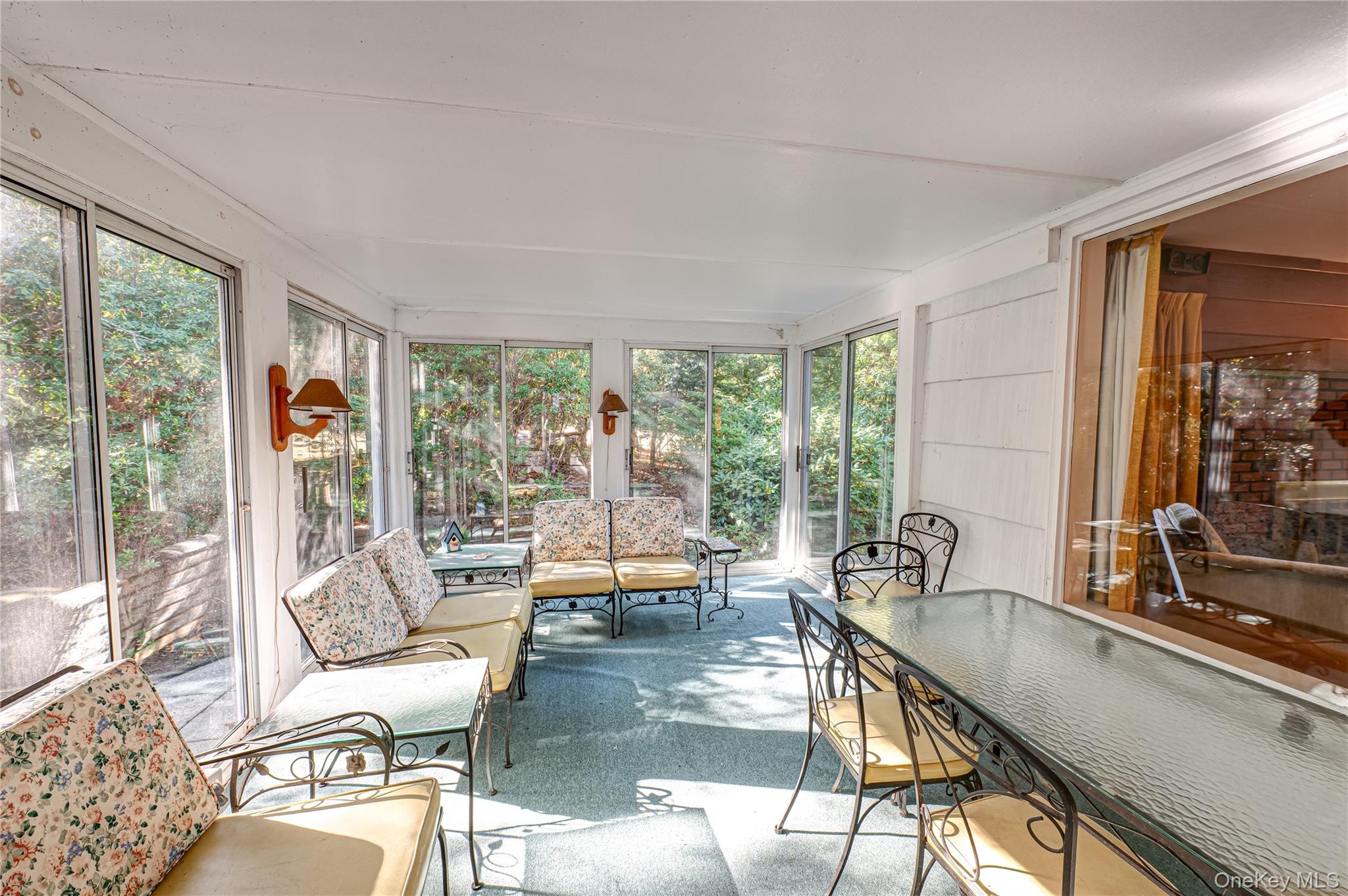 562 Old Bridge Road Northport, NY 11768 - Photo 13 of 25 a living room with furniture and a large window