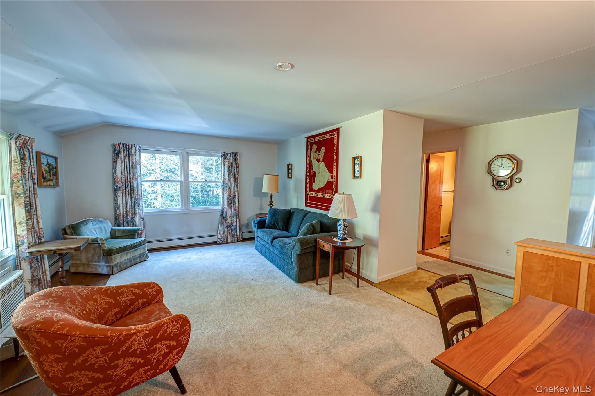 562 Old Bridge Road Northport, NY 11768 - Photo 19 of 25 a living room with furniture and a window