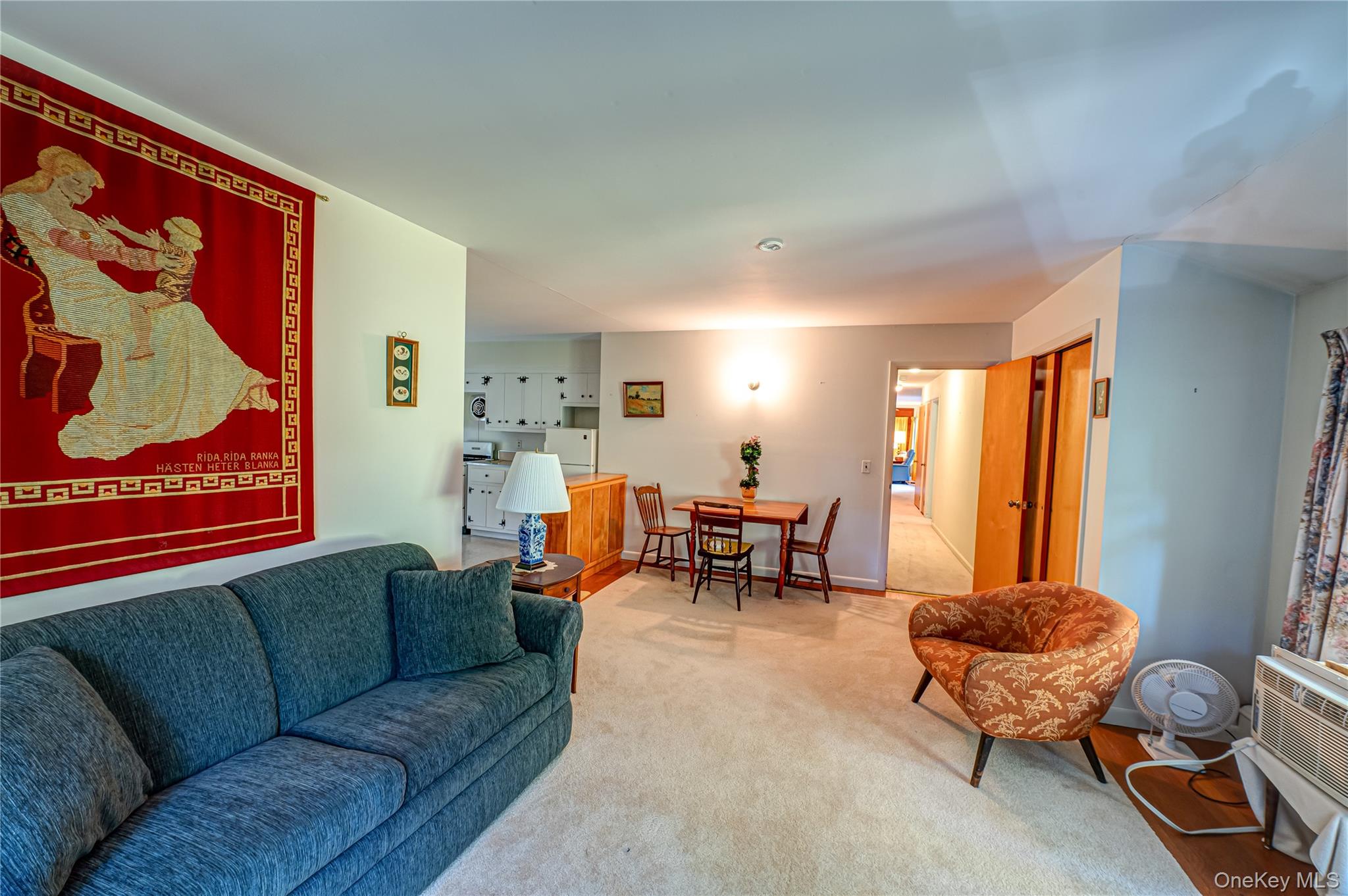 562 Old Bridge Road Northport, NY 11768 - Photo 20 of 25 a living room with furniture and a large window