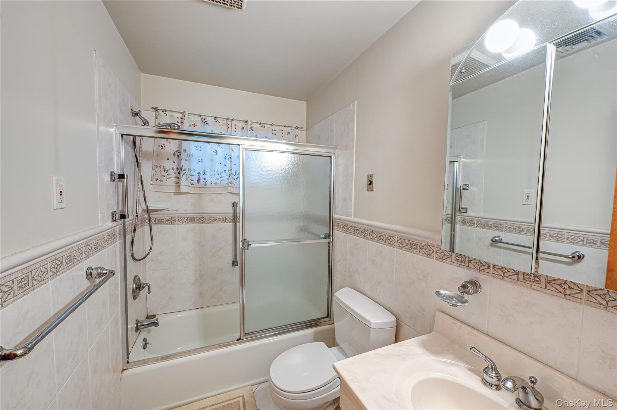562 Old Bridge Road Northport, NY 11768 - Photo 24 of 25 a bathroom with a shower and a toilet