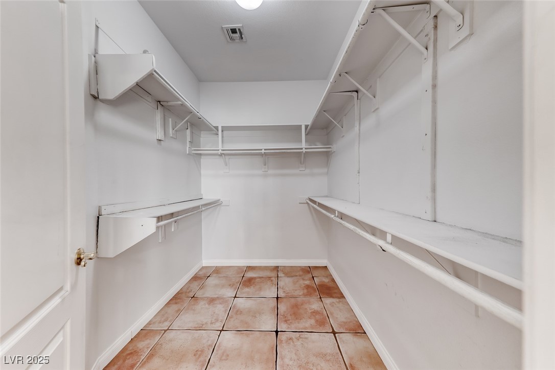 698 Magic Cove Court Boulder City, NV 89005 - Photo 19 of 41 Spacious closet with light tile patterned floors