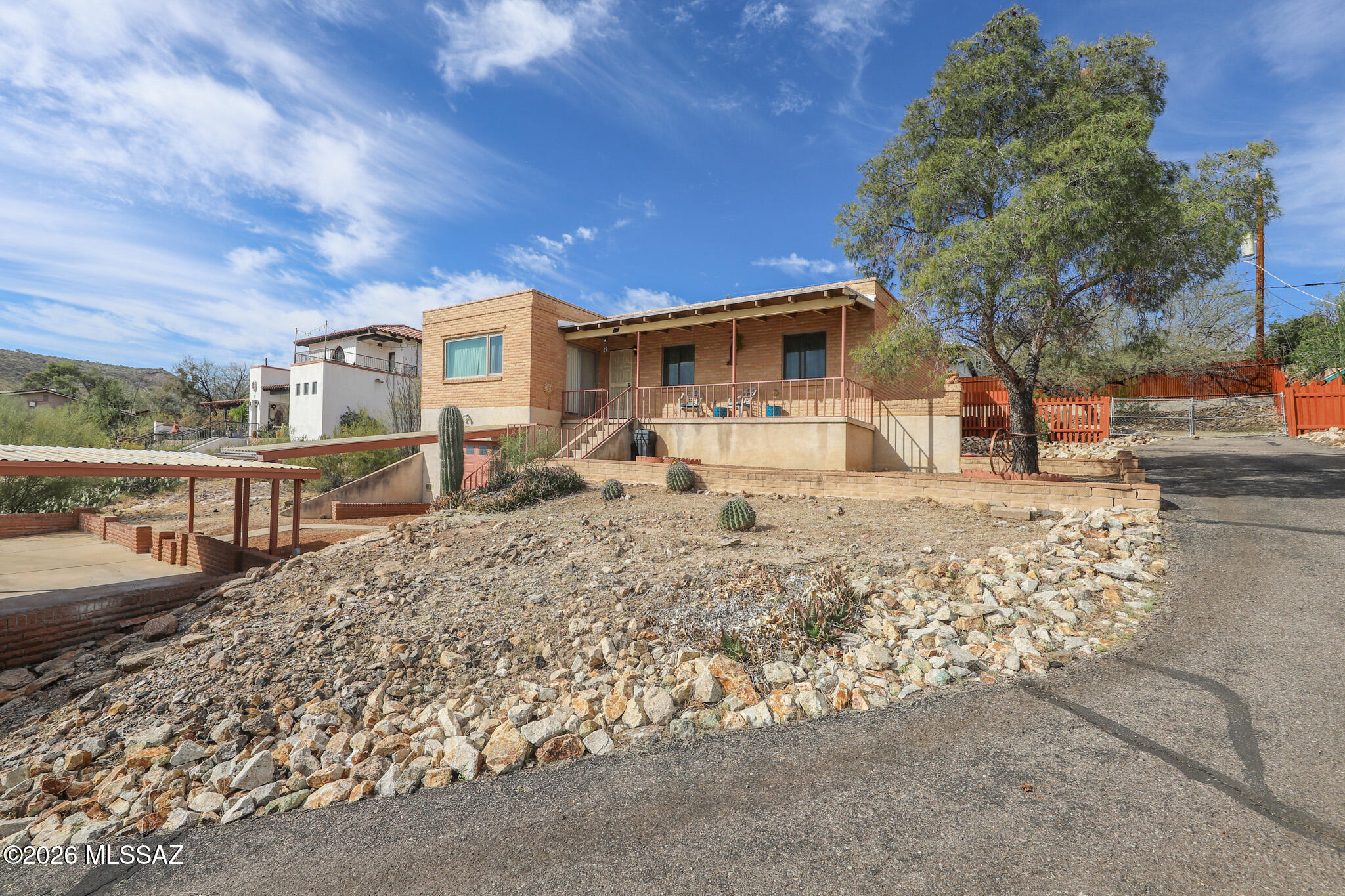37 North Silverbell Road Tucson, AZ 85745 - Photo 1 of 31 a front view of a house with a yard
