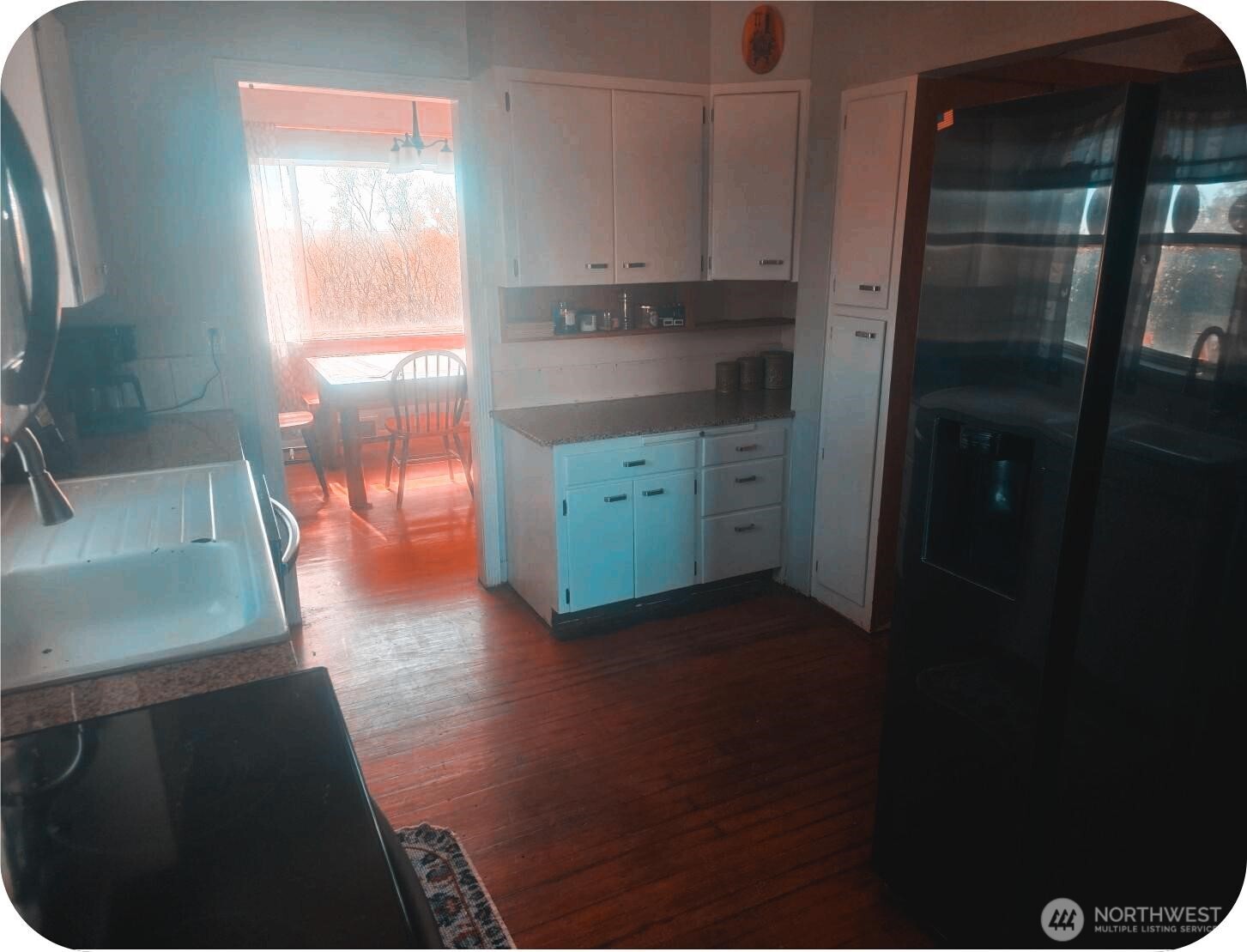 15650 Huddle Corner Road Harrington, WA 99134 - Photo 6 of 20 a kitchen with stainless steel appliances a refrigerator and a sink
