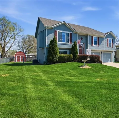 $315,000 | 21921 Gracie Drive, Peculiar, MO 64078