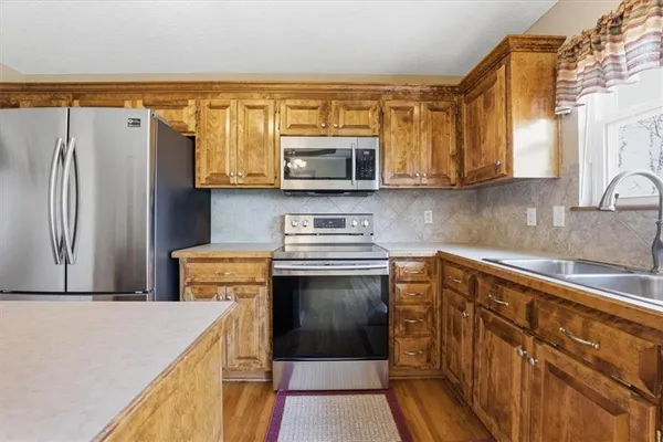 $315,000 | 21921 Gracie Drive, Peculiar, MO 64078