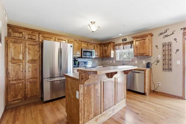 $315,000 | 21921 Gracie Drive, Peculiar, MO 64078