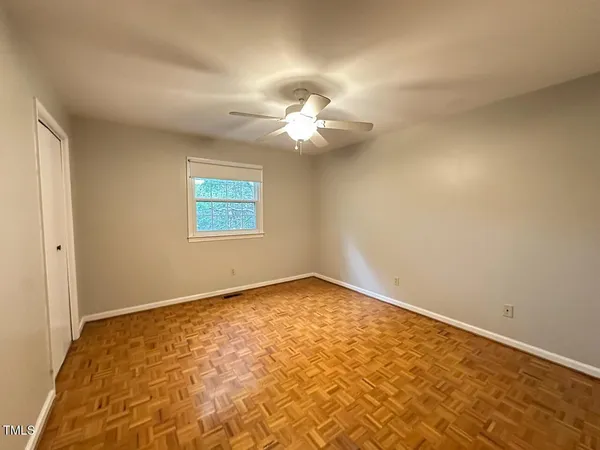 a view of a big room with carpet