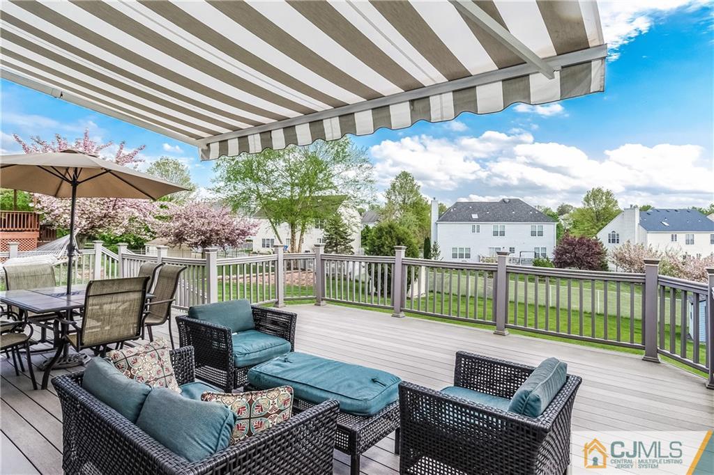 a view of a patio with couches table and chairs